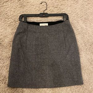 Beautiful mini skirt. Black and white wool / blend. Size 2. True to the size.